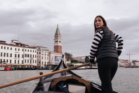 Beatrice standing on the traghetto gondola on the Grand Canal