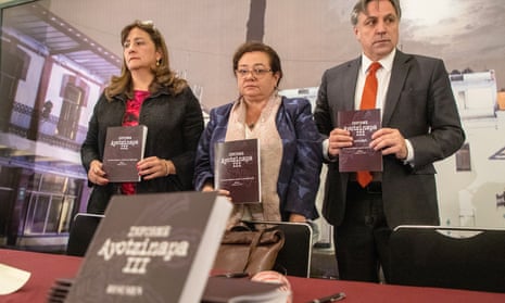 Angela Buitrago, Claudia Paz y Paz and Francisco Cox, present their report on the 2014 disappearance of 43 students in Mexico City, Mexico, on Monday.