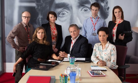 Dolan, third from left, in W1A.