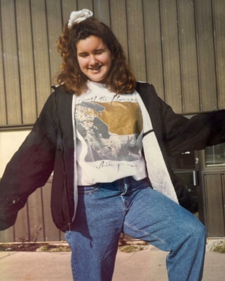 a photo of a woman in jeans and a tshirt