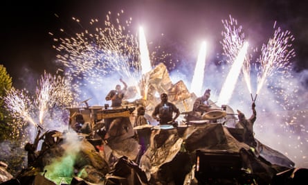 Performance by Les Commandos Percu street theatre company, with fireworks display.