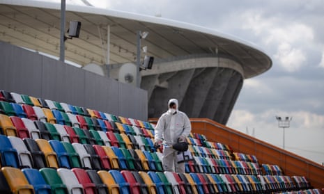 Seats are disinfected outside the Ataturk Olympic Stadium in Istanbul, which was due to host the Champions League final on 30 May.