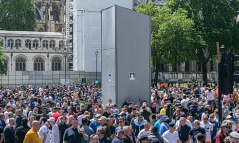 Hundreds of far-right activists gather around the Winston Churchill statue in Parliament Square which was covered up to protest after several statues were damaged during Black Lives Matter demonstrations.