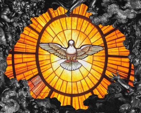 Photo of glass vitrai of the Holy Spirit as a white dove with spread wings