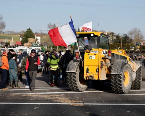 French farmers block the A61 motorway with tractors and straw bales to protest against government measures, including the culling of entire cattle herds, aimed at containing an outbreak of lumpy skin disease among livestock in France, and the EU-Mercosur free trade agreement, in Villefranche-de-Lauragais, in the Haute-Garonne department, France.