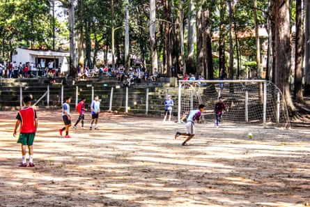 Youngsters train on Pequeninos do Meio Ambiente’s training pitch at the Romão Gomes military prison, on the edge of a forested State Park in Tremembé, São Paulo.