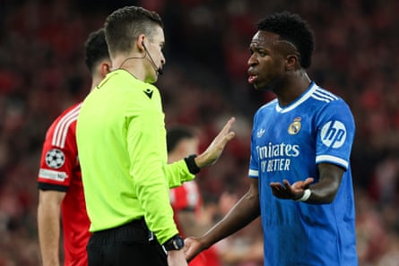 Real Madrid’s Vinícius Júnior speaks to the referee during Real Madrid’s match against Benfica.