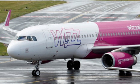 A Wizz Air plane on the runway