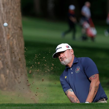Perske plays from a bunker at the 18th