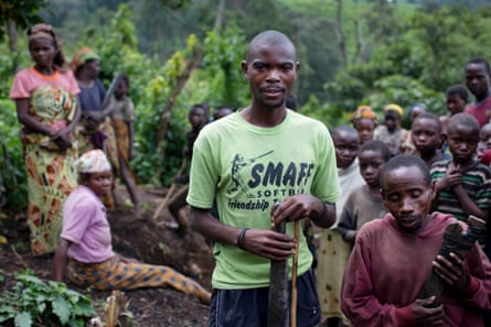 Mirindi Songolo, 23 years old, an autochthon, with other Pygmy people in an area of newly felled trees on the edge of the Kahuzi-Biéga national park near Bukavu