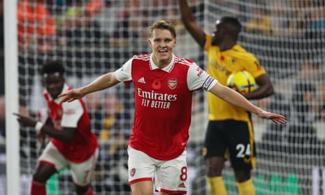 Martin Odegaard celebrates and scored a brace for the Gunners to extend their lead at the top of the table.