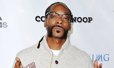 Snoop Dogg arrives at the premiere of Coach Snoop.