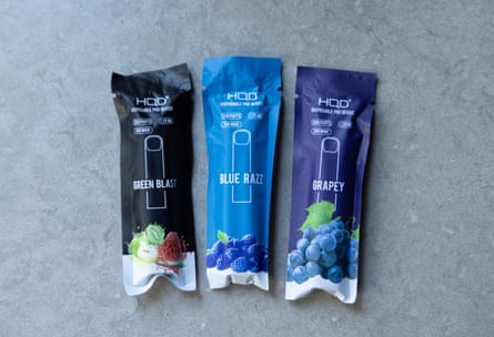 Three disposable e-cigarette vapes with different fruit flavours
