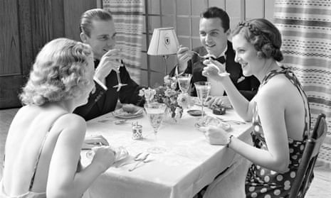 Guess what’s for pudding? Two couples enjoying dinner in the 1930s.