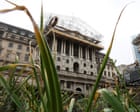 Bank of England expected to leave interest rates on hold; UK unemployment falls – business live