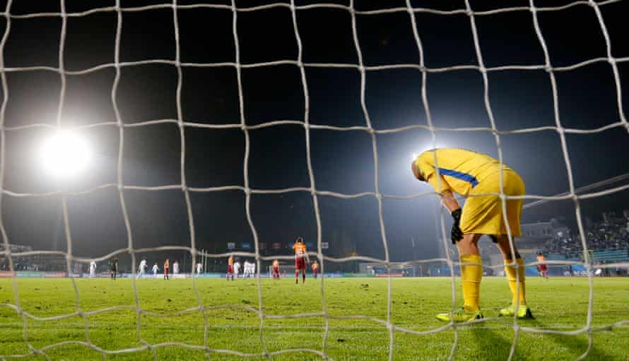 San Marino’s keeper Elia Benedettini reacts after his side conceded their tenth goal.