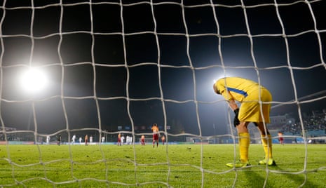 San Marino’s keeper Elia Benedettini reacts after his side conceded their tenth goal.