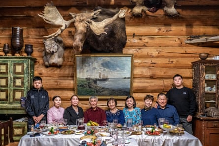Prokopiï, an Evenk hunter renowned throughout Yakutia, celebrates his sixtieth birthday in the company of his family
