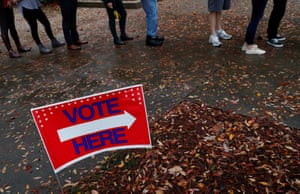 Voters wait in line in Atlanta, Georgia on 6 November 2018.