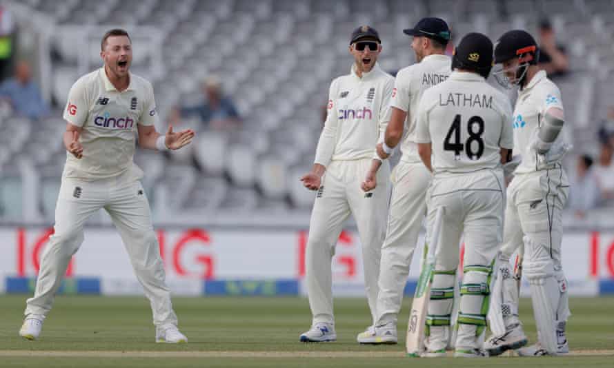 Ollie Robinson (left) celebrates dismissing New Zealand’s Kane Williamson during the first Test but his past tweets had already come to light and he was suspended for the second Test.