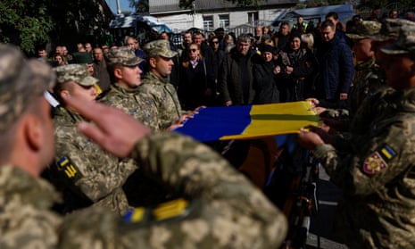 Funeral ceremony for Ukrainian serviceman Vitalii Baranov, a battalion commander who was killed in a fight against Russian troops in Donetsk region, at a cemetery in the village of Katiuzhanka, Kyiv region.