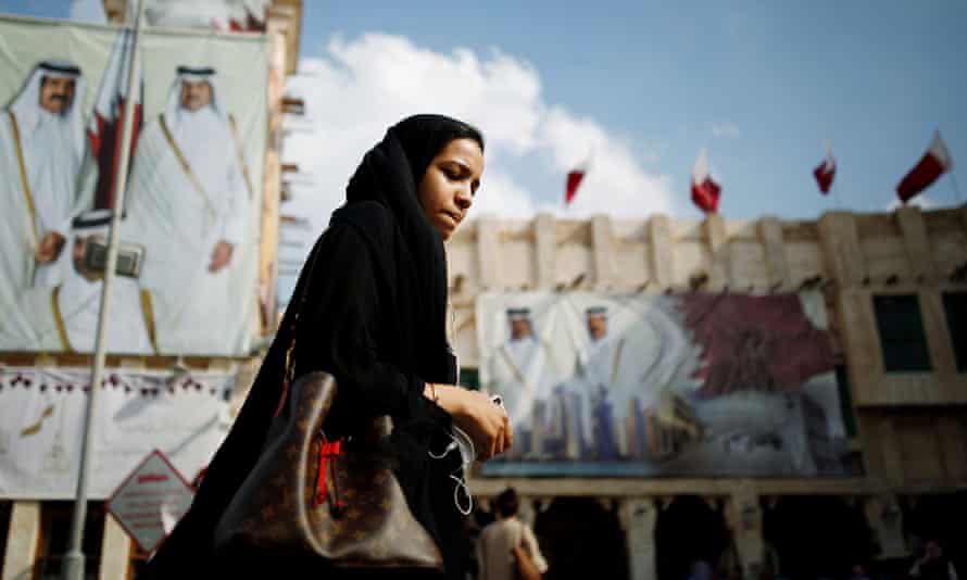 A young woman at a marketplace in Doha, Qatar.