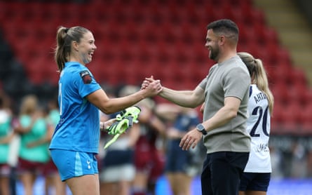 Martin Ho congratulates Lize Kop after the final whistle