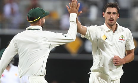 Mitchell Starc celebrates after dismissing Sami Aslam during day three of the first Test.