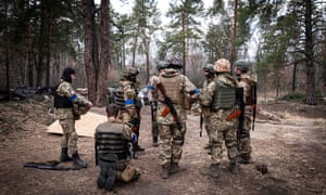 Ukrainian infantry and artillery units on the outskirts of Kyiv are patrolling the area and creating defensive trenches for a possible attack by Russian troops.