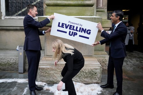Sunak and Hunt posted Powered by Leveling up signs outside the market and Britcliffe tried to move out of the way.