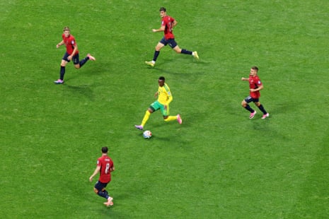 Thapelo Maseko goes a run with the Czechia in hot pursuit.