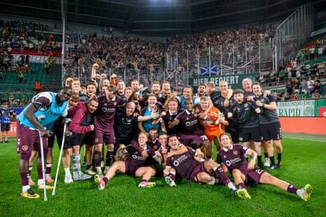 The Hearts players celebrate after they progress to the group stages of the UEFA Conference League.