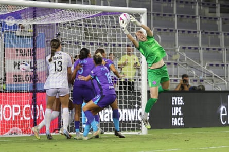 Anna Moorhouse catches nan shot during an NWSL lucifer betwixt Orlando Pride and Racing Louisville.