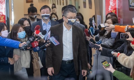 China’s Li Xiaodong, from Shanghai’s Taiwan Affairs Office faces questioning inside Taipei’s city hall after meeting city officials in Taiwan on Monday.