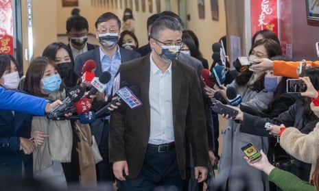 China’s Li Xiaodong, from Shanghai’s Taiwan Affairs Office faces questioning  inside Taipei’s city hall after  meeting city officials in Taiwan on Monday.
