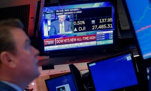 Trader works on the floor at the New York Stock Exchange last night