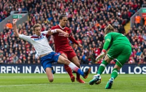 Stoke City’s Peter Crouch can’t reach the ball.