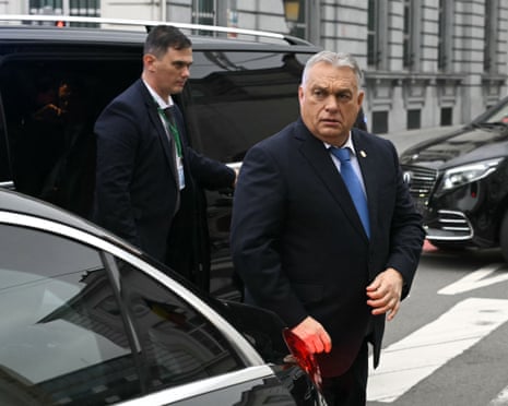 Hungary's prime minister Viktor Orbán (R) arrives for a meeting with the European political party's leaders 'Patriots.eu' ahead of the European Council in Brussels.