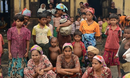 Muslim Rohingyas in the courtyard of a school sheltering displaced people in the village of Theik Kayk Pyim, on the outskirts of Sittwe, capital of Myanmar’s western Rakhine state.