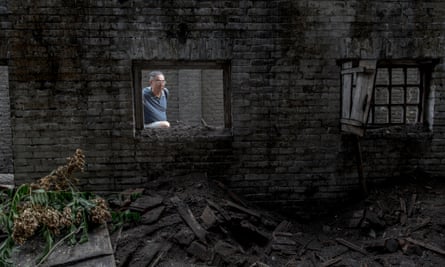 Liu Linsheng, whose father escaped the Taiyuan concentration camp, visiting its only remaining cell blocks.