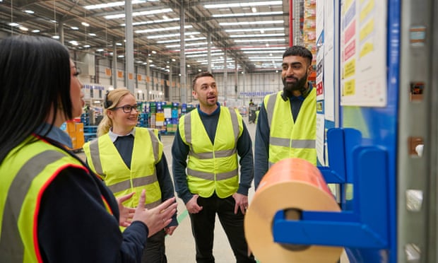 Aldi staff in the warehouse