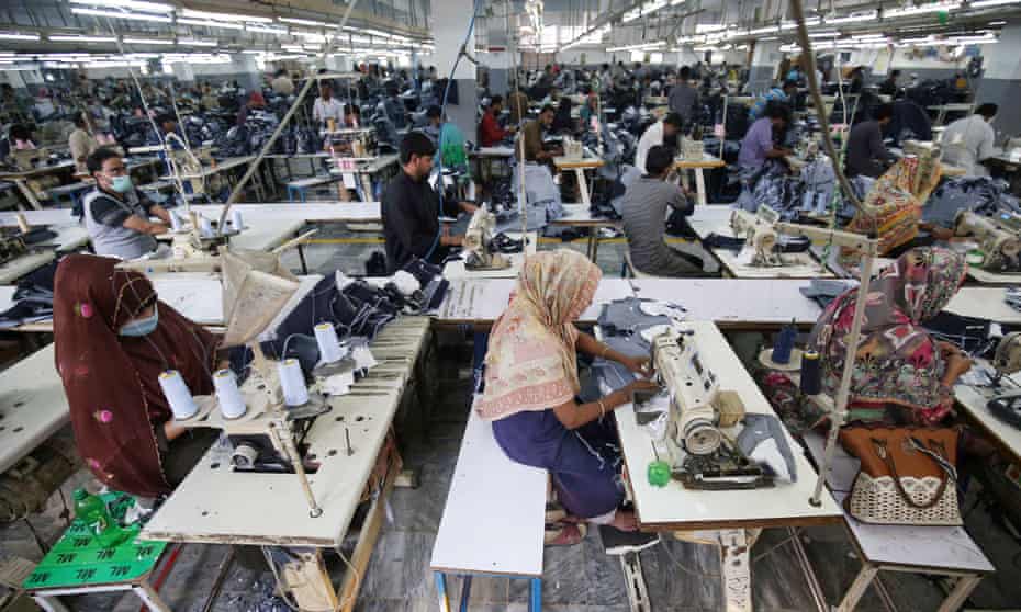 Workers at a garments factory in Karachi. The textile industry is the largest manufacturing industry in Pakistan.
