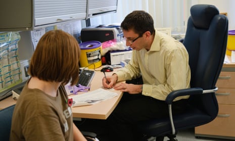 Doctor and Patient in a consulting room at a GP surgery