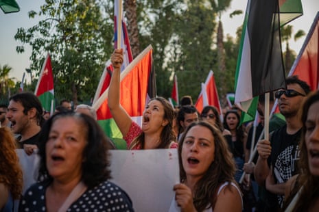 Pro-Palestinian demonstrators protest against the arrival of the Crown Iris.