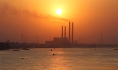 Men fish from their boats during sunset on the River Nile in front of a South Cairo Electricity Distribution Company power station in Cairo, Egypt August 9, 2017. REUTERS/Amr Abdallah Dalsh - RC139677BA20