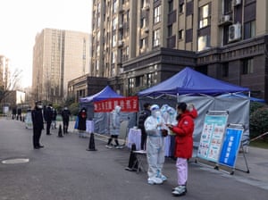 Residents queue to undergo Covid testing in Xi’an on the city’s seventh day in lockdown.
