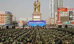 Chinese military police attending an anti-terrorist oath-taking rally in Hotan, also known as Hetian, in China’s Xinjiang province in 2017.