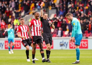 Bournemouth defender Chris Mepham looks crestfallen as he is shown the red card