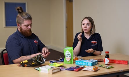 Staff at Rogers Wholesale Foods in Wolverhampton taste-test products