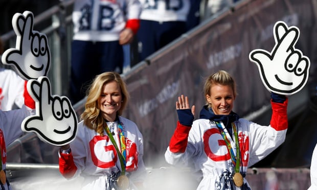 Britain’s Olympic and Paralympics team wave National Lottery logos on their homecoming parade in 2016.